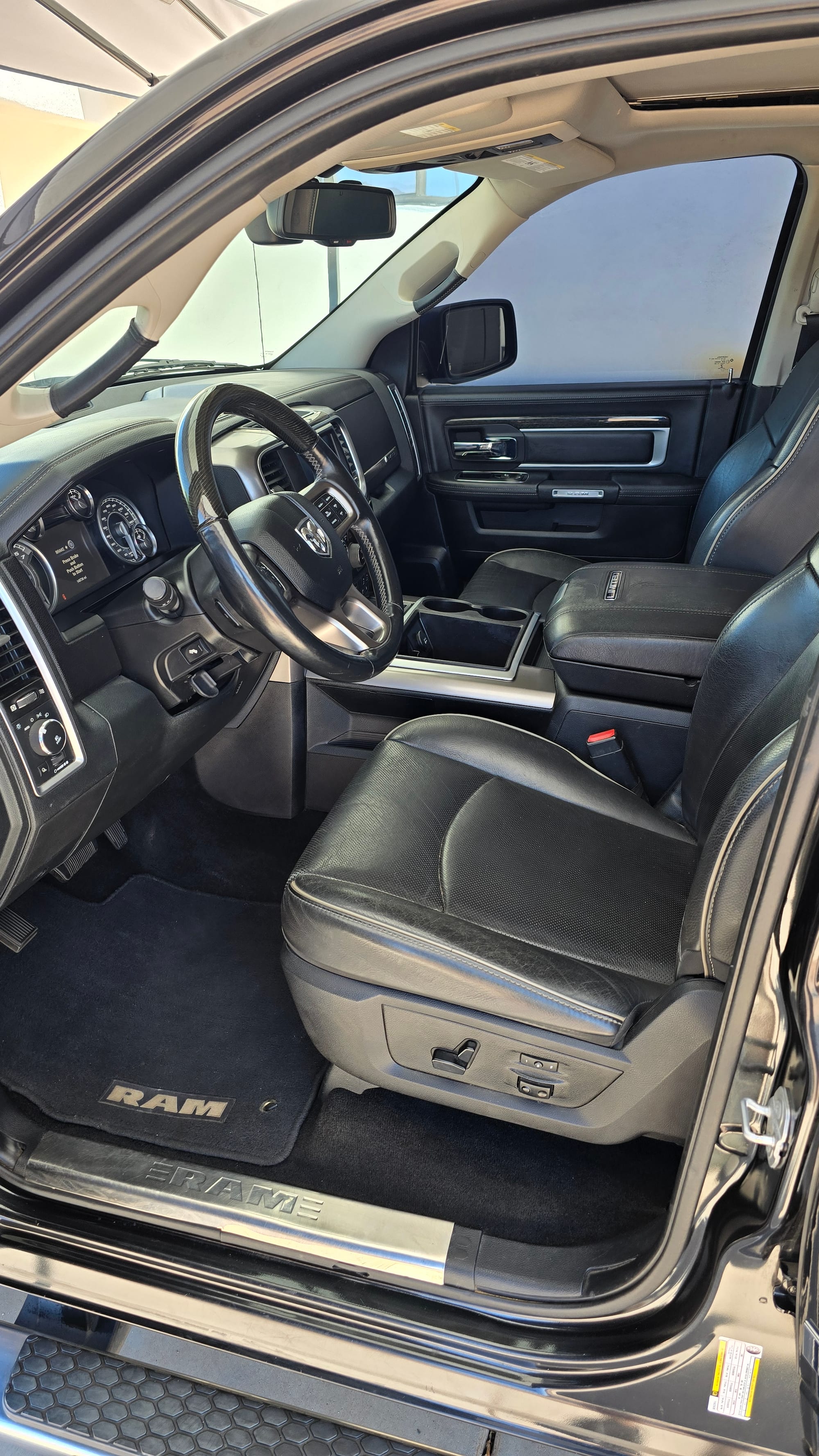 Clean leather front seat after a full interior detail in Glendale, AZ