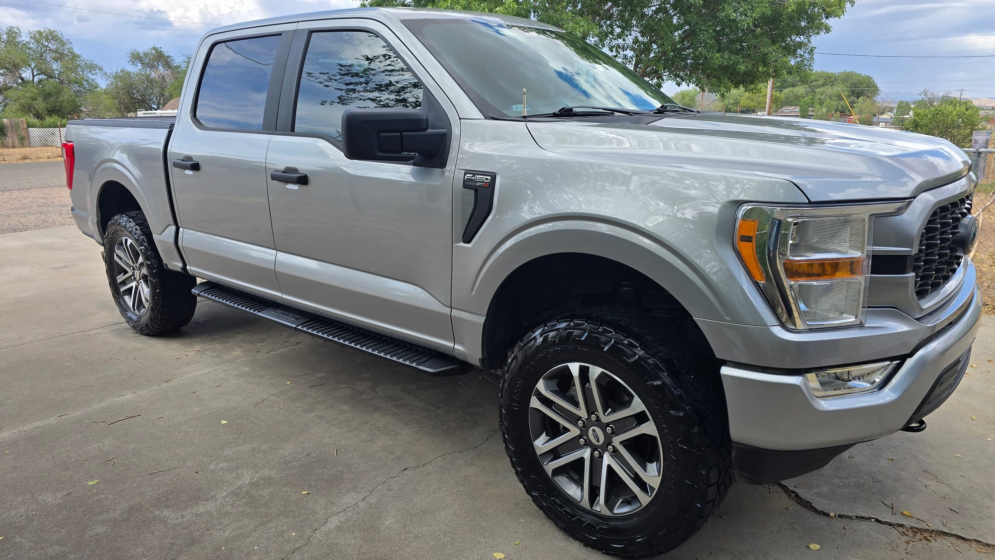 Clean Ford F-150 parked on a driveway after a full detail in the Greater Phoenix Area