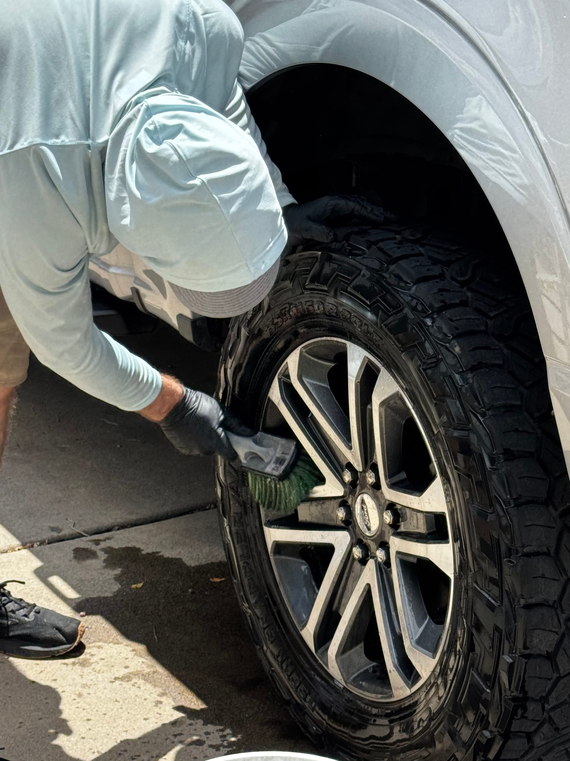 Detailing the wheel and tire on a Ford F-150